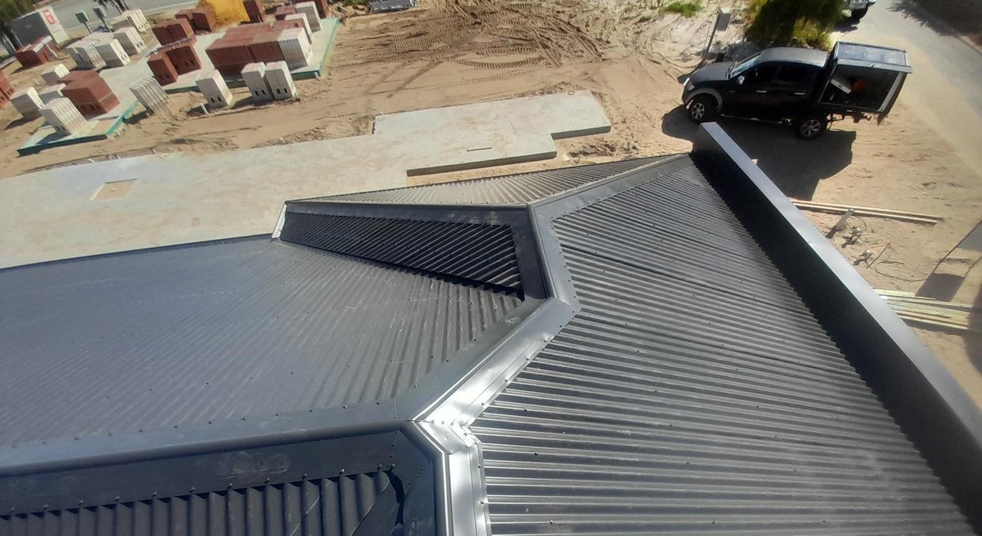Hip intersections and sheet planes on a finished residential roof